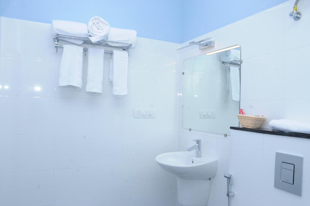 Koupelna v ubytování Sreeparthi Hotel
