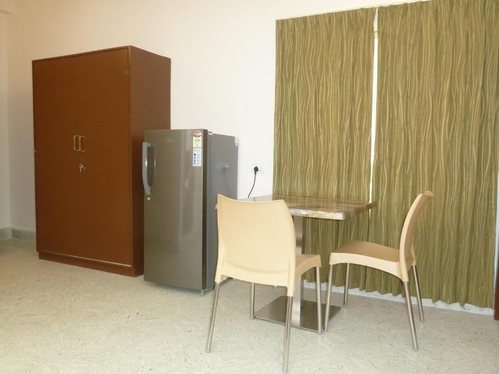 Kuchyň nebo kuchyňský kout v ubytování Sreeparthi Hotel