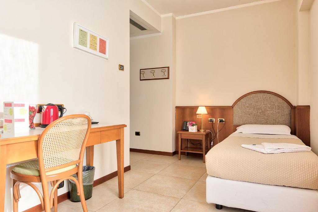 Posteľ alebo postele v izbe v ubytovaní Albergo Villa Priula