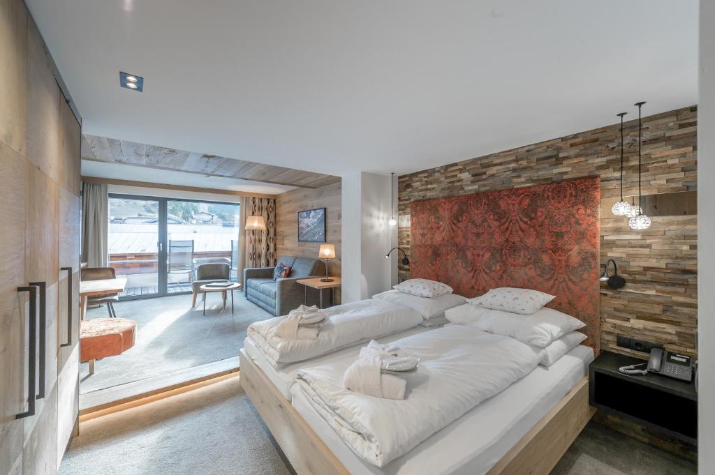 Postel nebo postele na pokoji v ubytování Hotel Wiesental