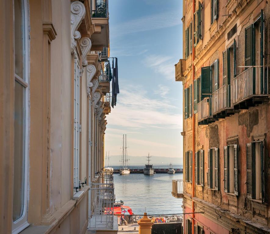 a view of a river from between two buildings at Regina Elena in Naples