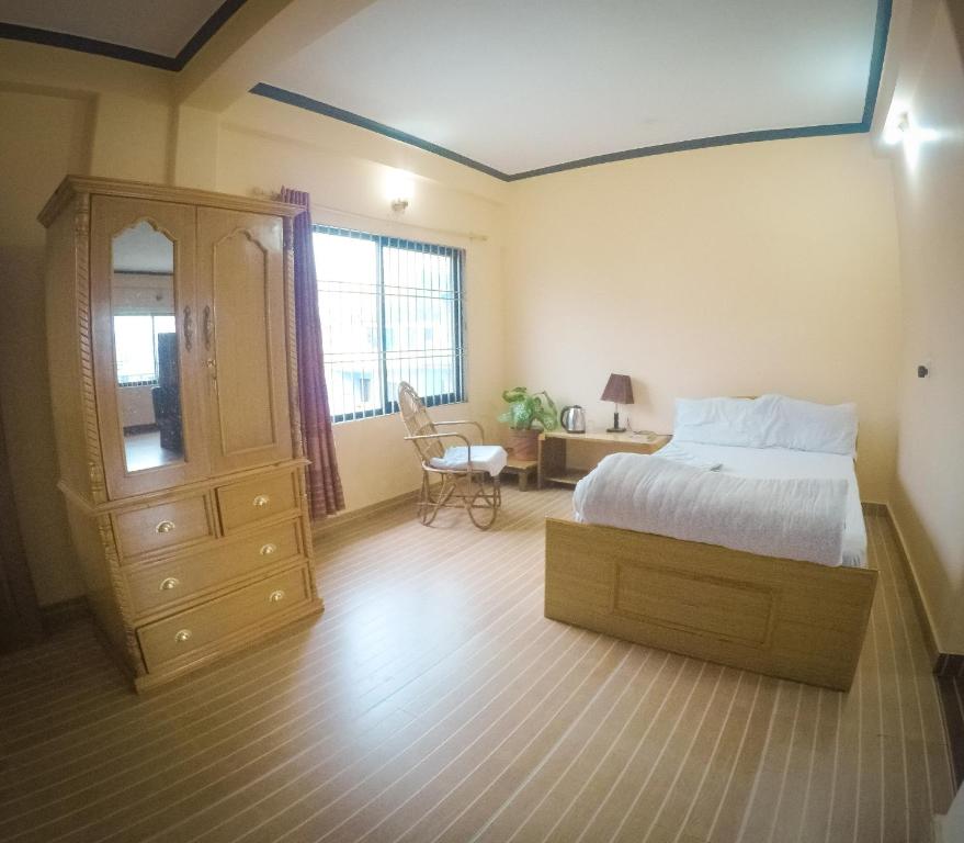 Hotel Mountain View - Lakeside Pokhara客房内的一张或多张床位