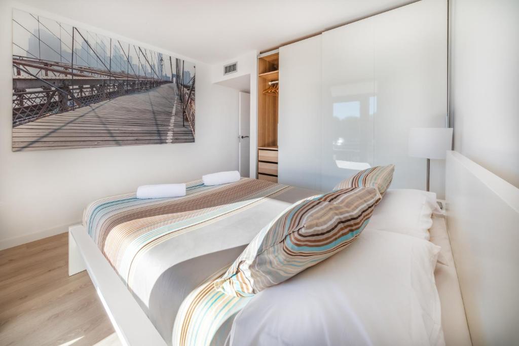 Postel nebo postele na pokoji v ubytování Agaró Cambrils Apartments
