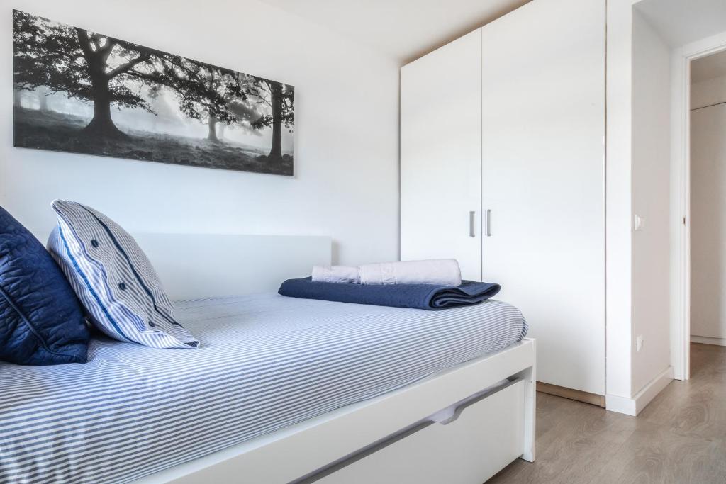 Postel nebo postele na pokoji v ubytování Agaró Cambrils Apartments