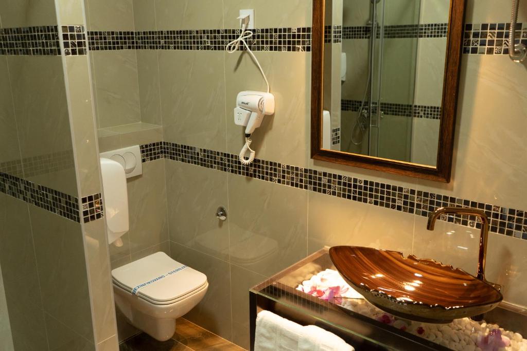 Koupelna v ubytování Garni Hotel Lotos