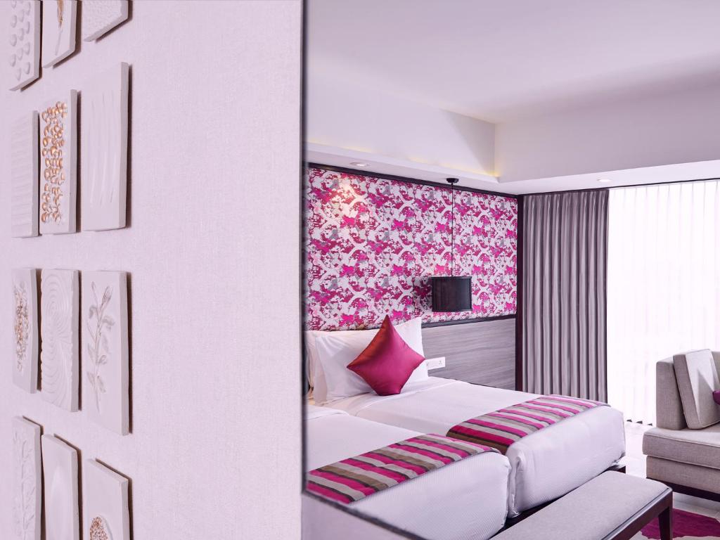 Postel nebo postele na pokoji v ubytování Vivanta Kathmandu