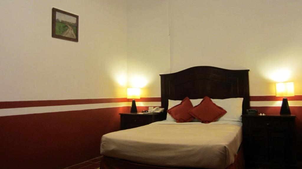 Postel nebo postele na pokoji v ubytování Castelmar Hotel