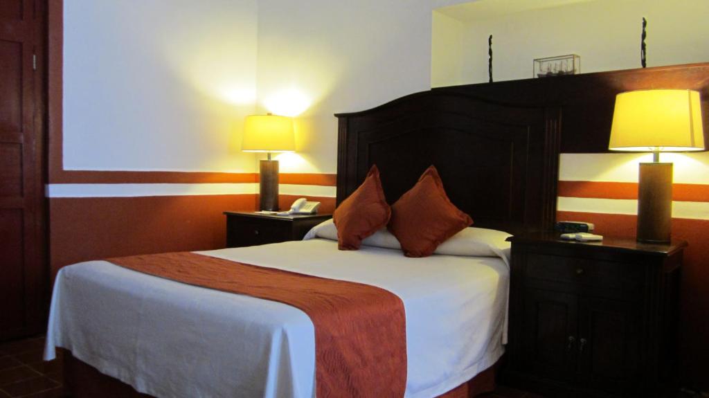 Postel nebo postele na pokoji v ubytování Castelmar Hotel
