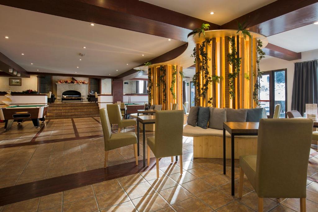 Posezení v ubytování Hotel Piolets Soldeu Centre