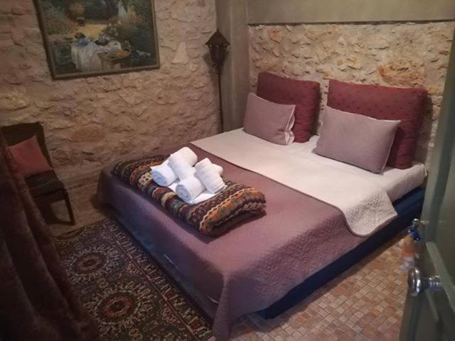 Posteľ alebo postele v izbe v ubytovaní Athens Quinta