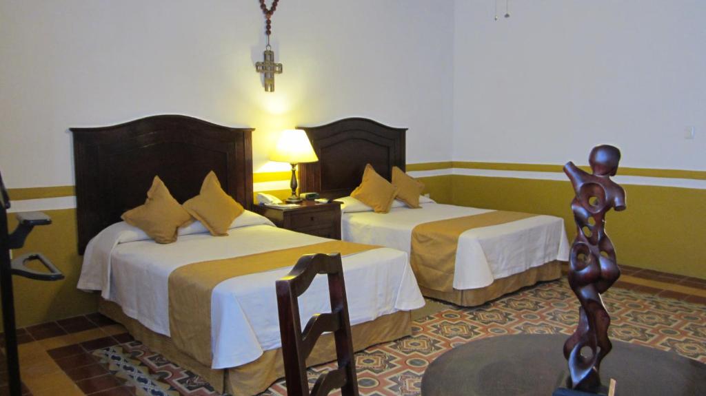 Postel nebo postele na pokoji v ubytování Castelmar Hotel