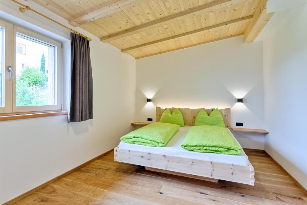 Postel nebo postele na pokoji v ubytování Frühaufhof