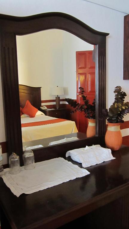 Postel nebo postele na pokoji v ubytování Castelmar Hotel