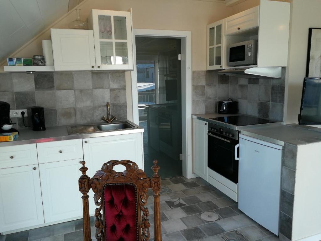 Kuchyň nebo kuchyňský kout v ubytování Apartmenthaus in Walle
