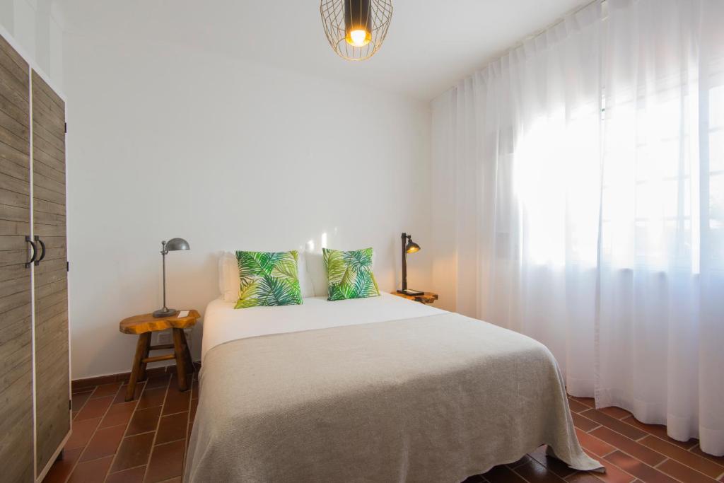 Postel nebo postele na pokoji v ubytování Villa Eira