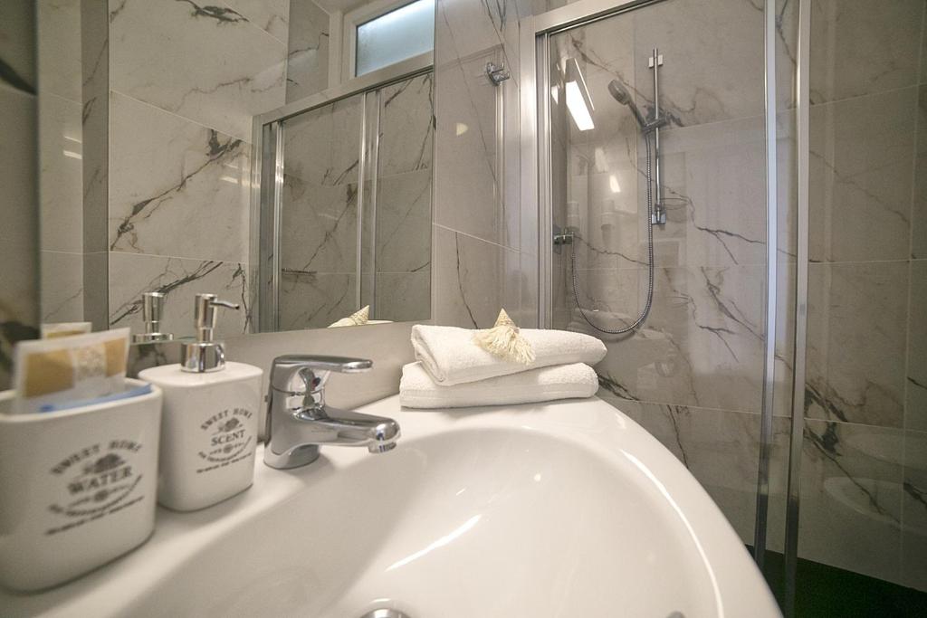 Koupelna v ubytování Hotel Pinocchio