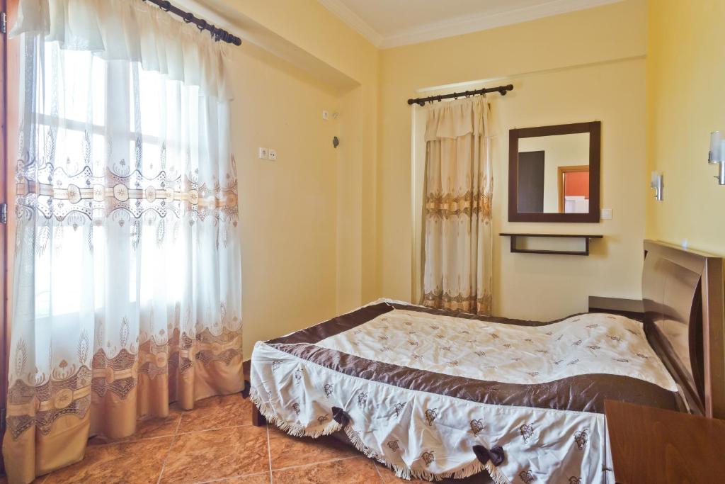 Postel nebo postele na pokoji v ubytování Montemar Studios & Apartments