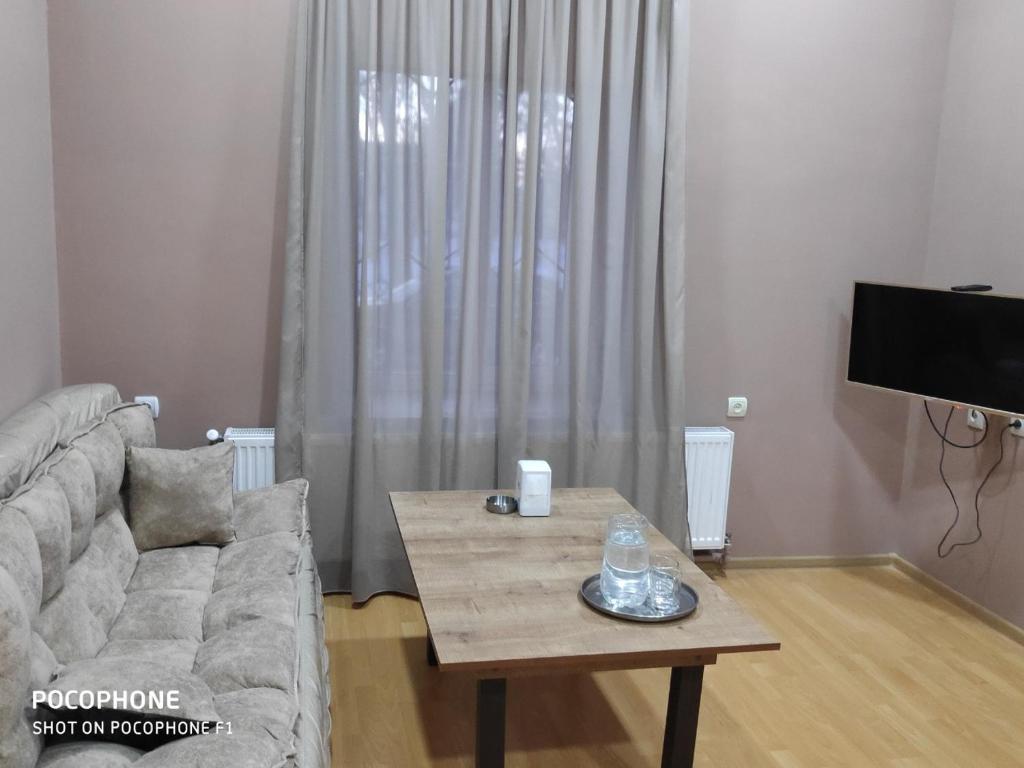 TV a/nebo společenská místnost v ubytování Ideal
