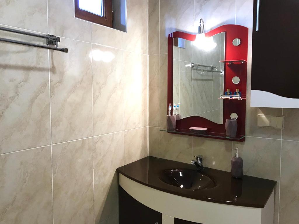 Koupelna v ubytování Hotel Aragvi