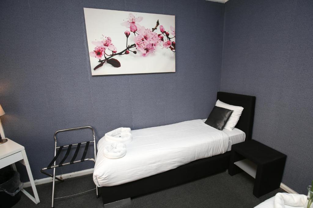 Postel nebo postele na pokoji v ubytování Hotel Flipper Amsterdam