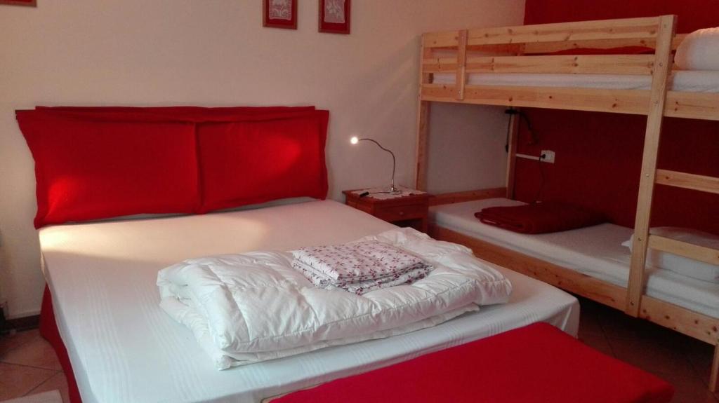 Postel nebo postele na pokoji v ubytování Residence Dei Walser
