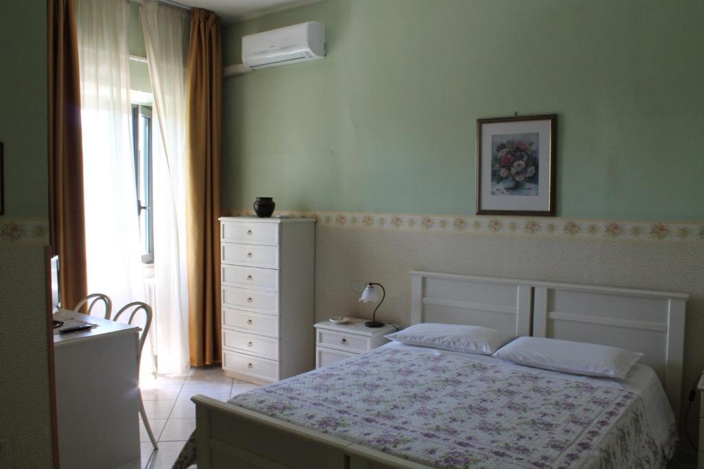 Posteľ alebo postele v izbe v ubytovaní Hotel La Villa