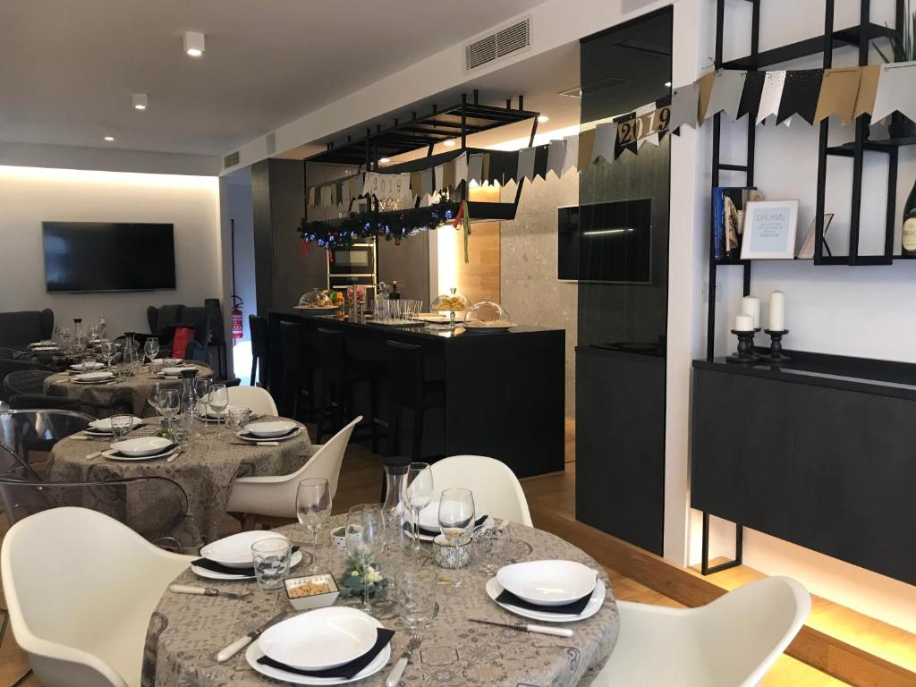Kuchyň nebo kuchyňský kout v ubytování MYHOME 75 Premium Luxury B&B