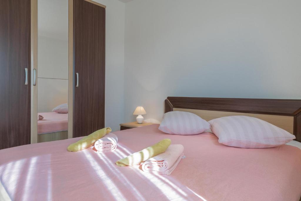 Postel nebo postele na pokoji v ubytování Ferienhaus Mary