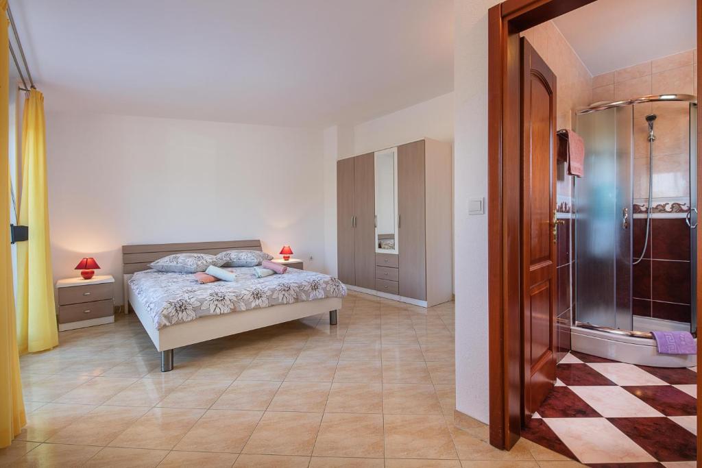 Postel nebo postele na pokoji v ubytování Ferienhaus Mary