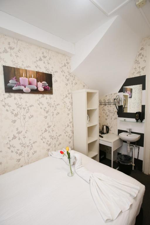 Postel nebo postele na pokoji v ubytování Hotel Flipper Amsterdam