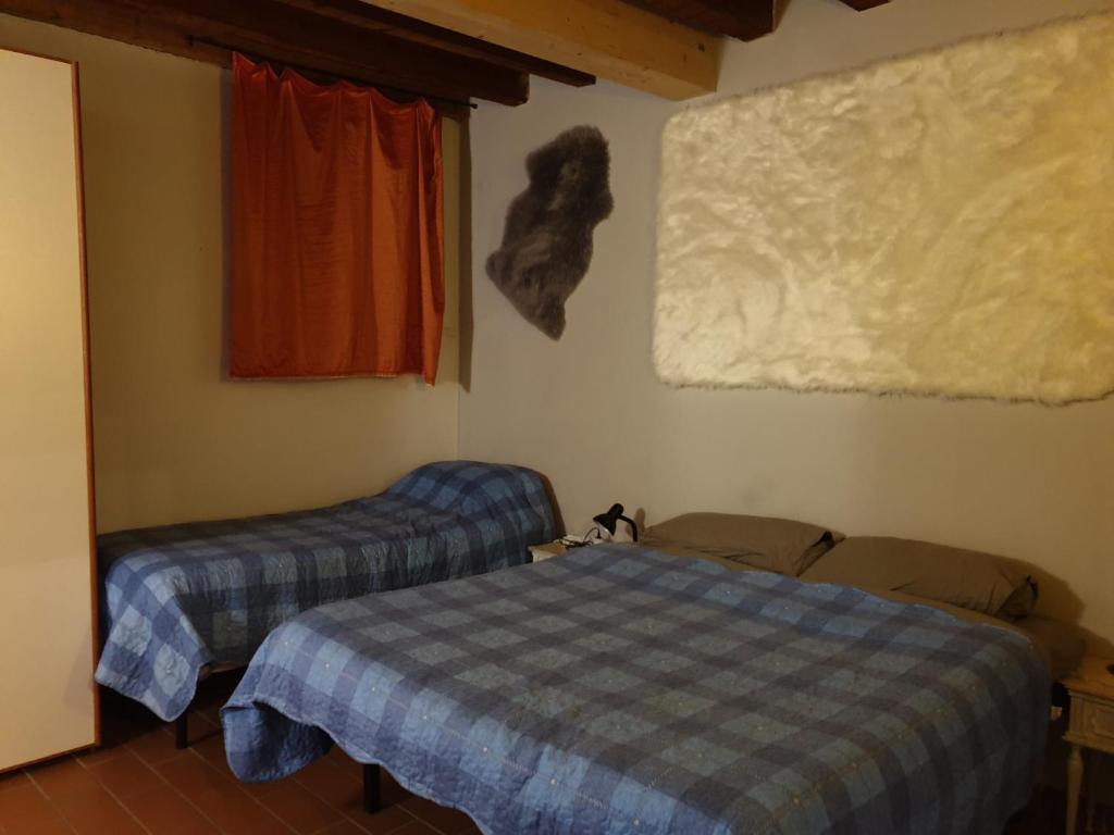 Postel nebo postele na pokoji v ubytování La Casa di Daniele