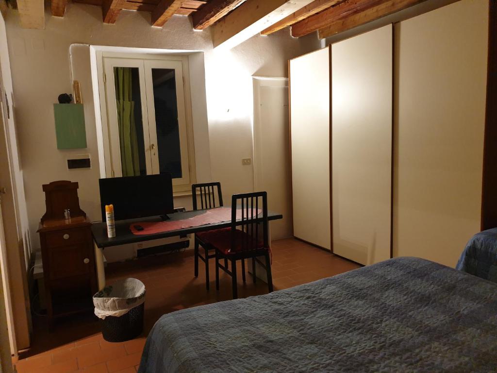 Postel nebo postele na pokoji v ubytování La Casa di Daniele