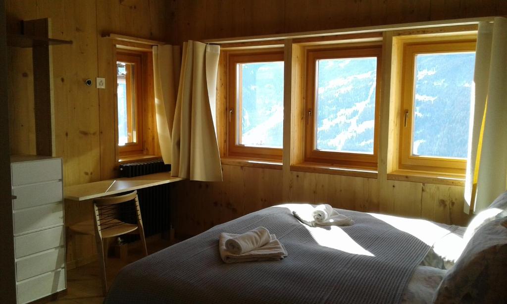 Postel nebo postele na pokoji v ubytování Hotelski