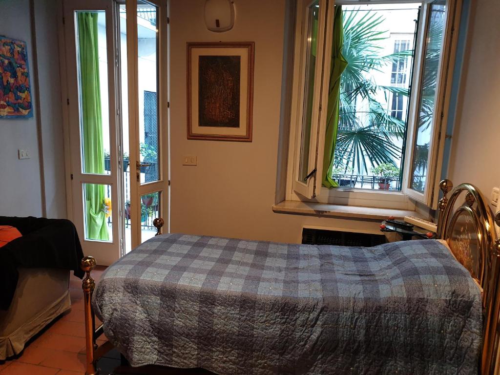 Postel nebo postele na pokoji v ubytování La Casa di Daniele
