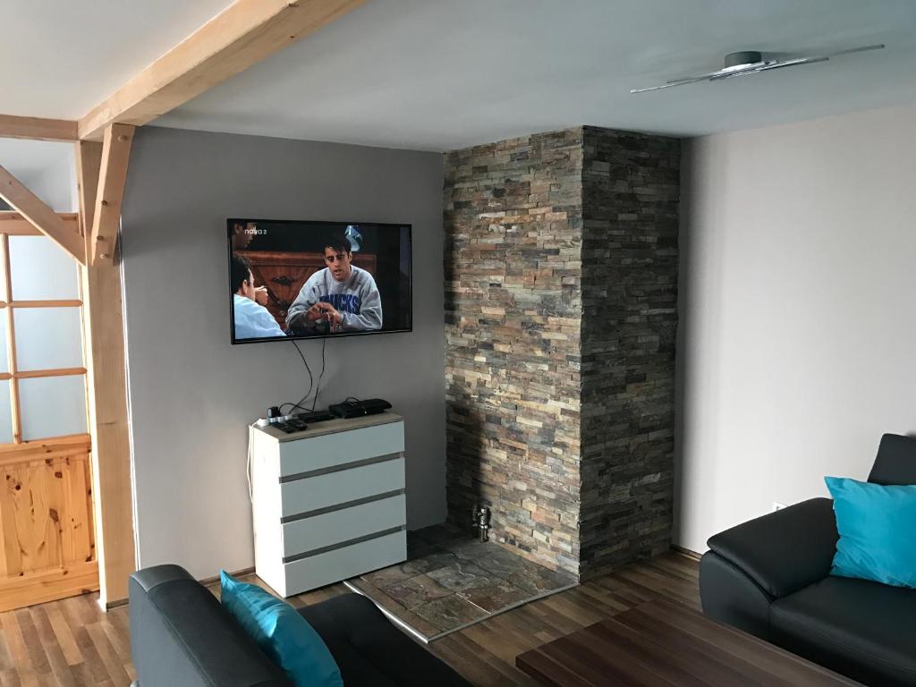 TV a/nebo společenská místnost v ubytování Vila Pasečná - Lipno