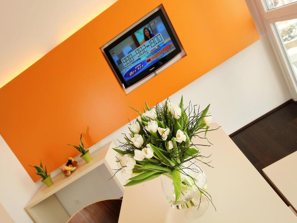 TV a/nebo společenská místnost v ubytování Hotel Royal X