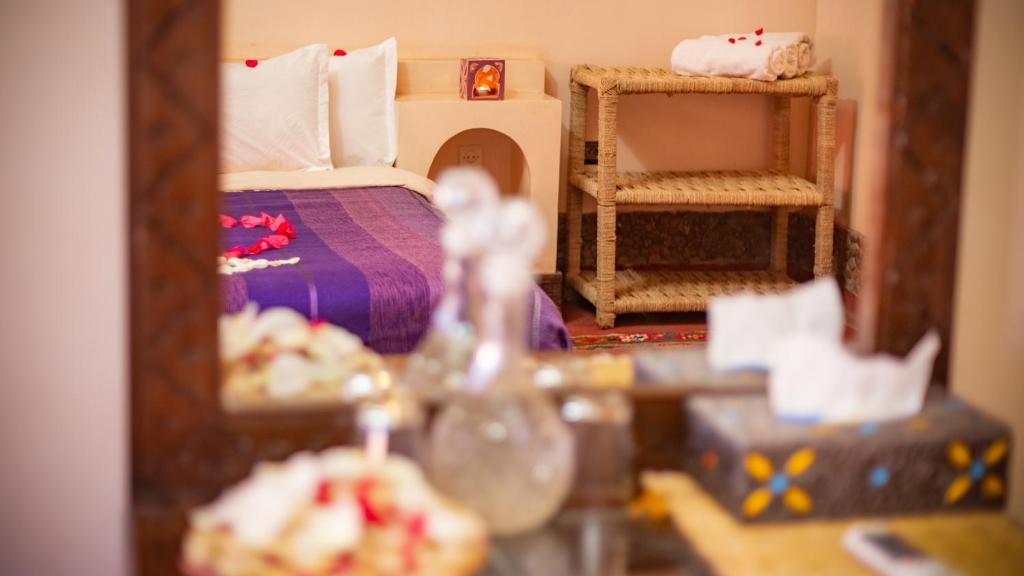 Postel nebo postele na pokoji v ubytování Ecolodge l'île de Ouarzazate