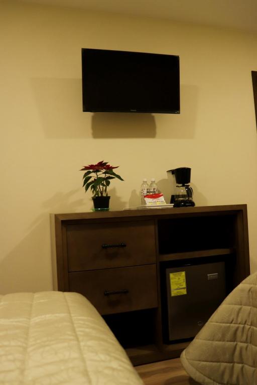TV a/nebo společenská místnost v ubytování Hotel JYE by Serranillo, Mineral del Monte Hgo