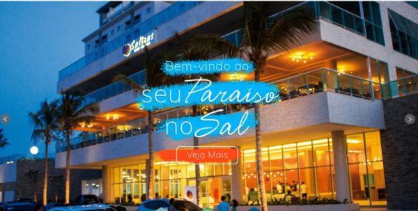 a building with a sign that reads sushi paradise nojad at Salinas Park Resort in Salinópolis