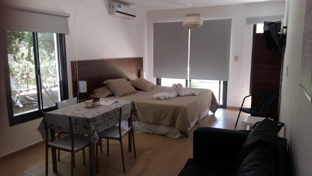 Postel nebo postele na pokoji v ubytování BOULEVARD DEPARTAMENTOS II