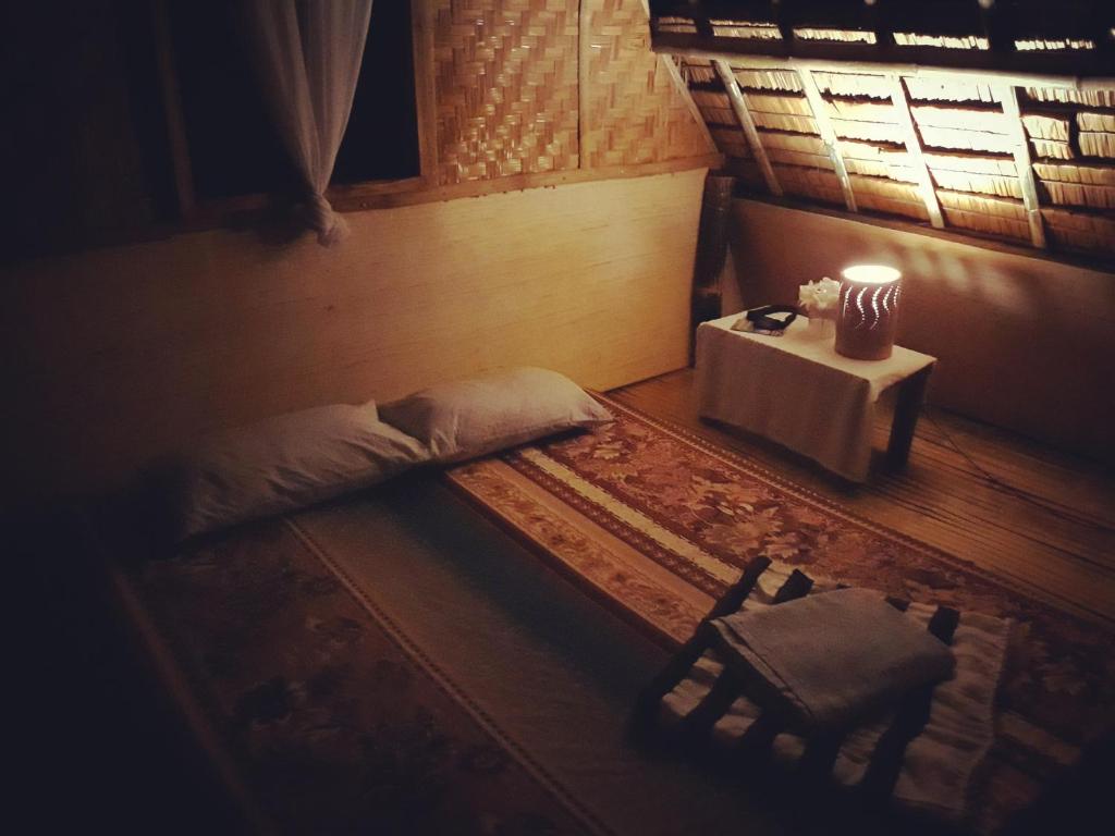 Ein Bett oder Betten in einem Zimmer der Unterkunft Lazy Lizard Hostel