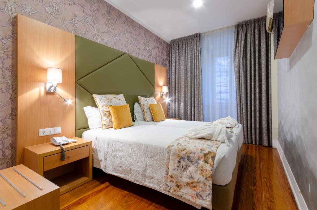 Hotel INN Rossio - Resim 30