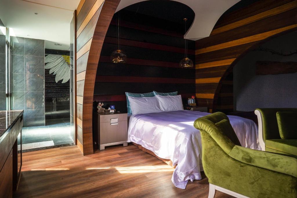 Postel nebo postele na pokoji v ubytování Shu Xin Motel