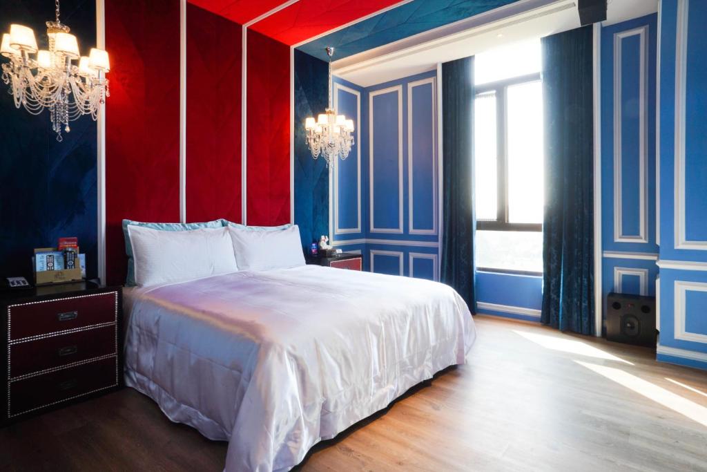 Postel nebo postele na pokoji v ubytování Shu Xin Motel