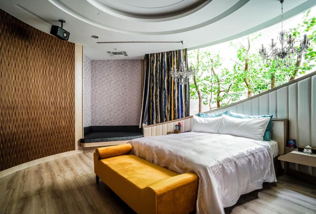 Postel nebo postele na pokoji v ubytování Shu Xin Motel