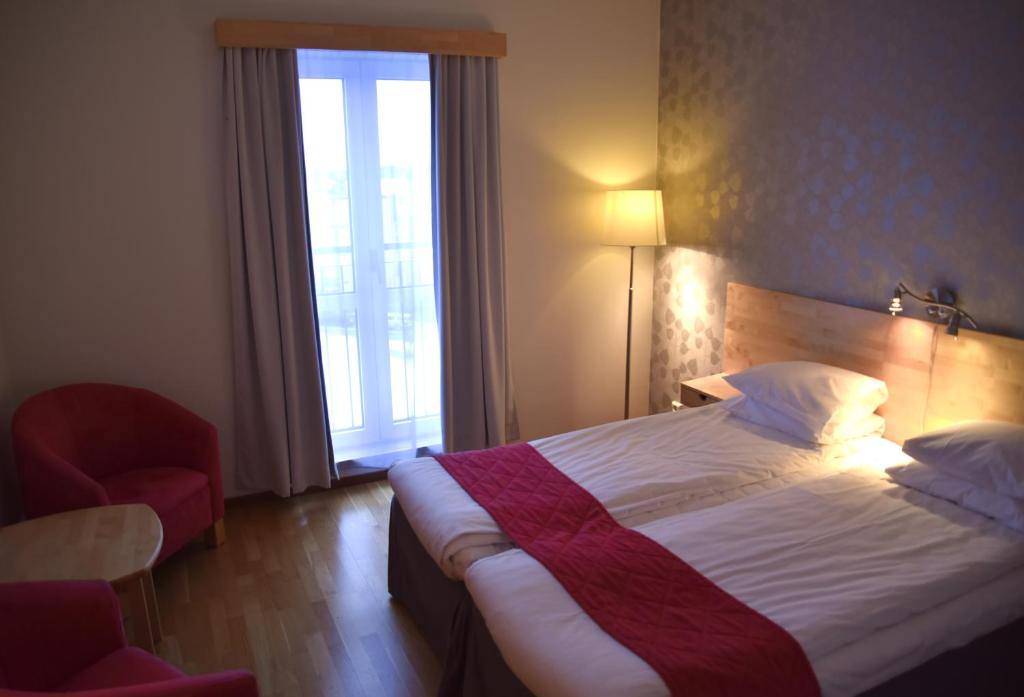 Postel nebo postele na pokoji v ubytování Hotell Årjäng