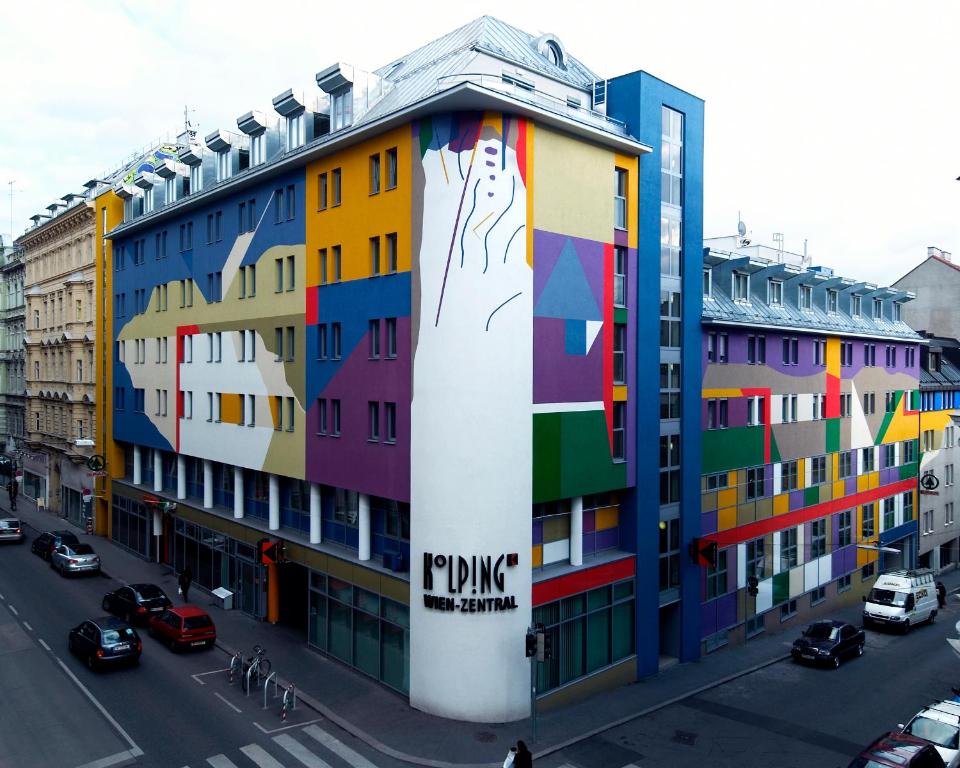 
a large building with graffiti on the side of it at Hotel Kolping Wien Zentral in Vienna
