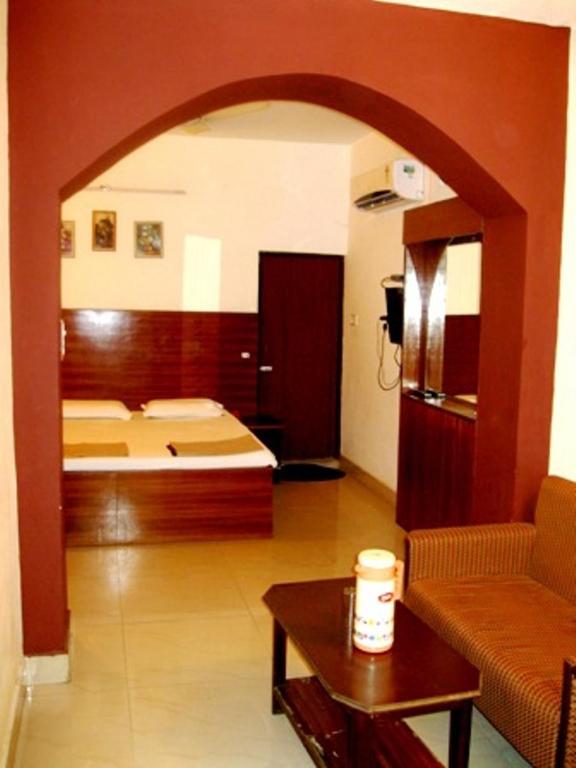 Postel nebo postele na pokoji v ubytování Hotel Ajay International
