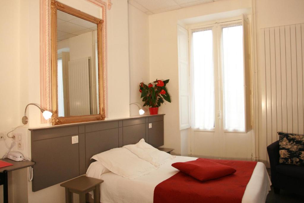 Postel nebo postele na pokoji v ubytování Hotel Christian