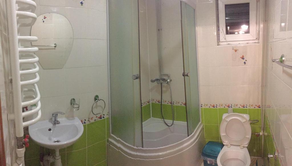 Vannituba majutusasutuses Guest House U Myrona